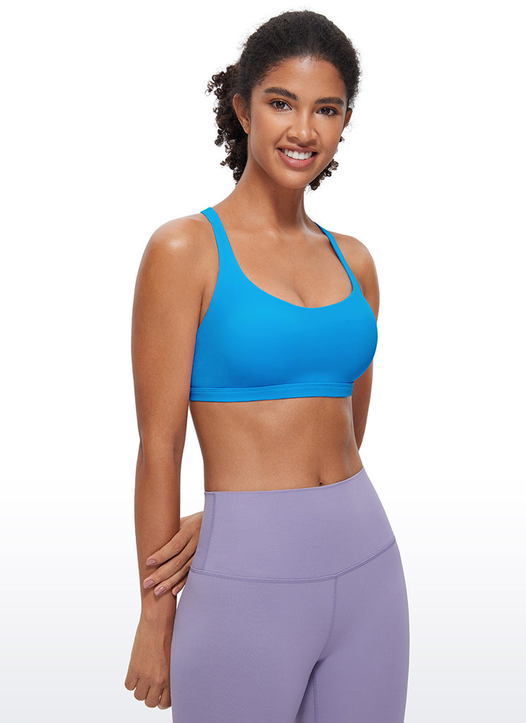 CRZ YOGA Women's Yoga Light Support Nakedfeel Strappy Bra Low Cut Madagascar Blue