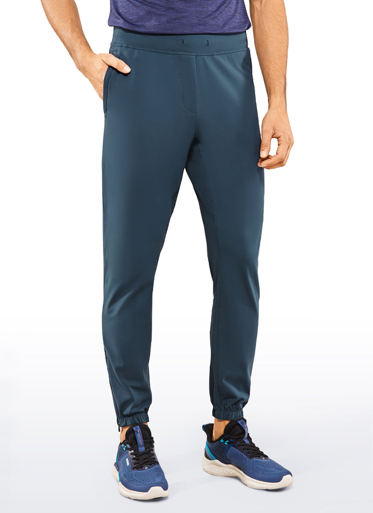 CRZ YOGA Men's Run Slim Fit On the Travel Joggers 30''- Ankle Zipper True Navy