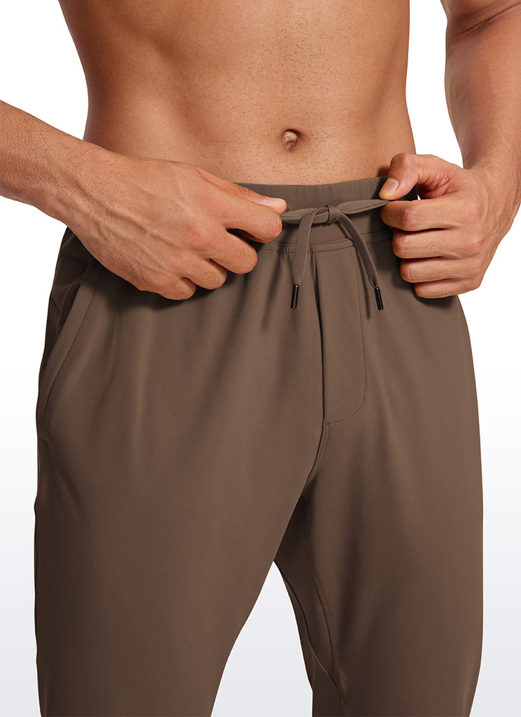 CRZ YOGA Men's Train Relaxed Fit On the Travel Pants 30'' Dark Olive Brown