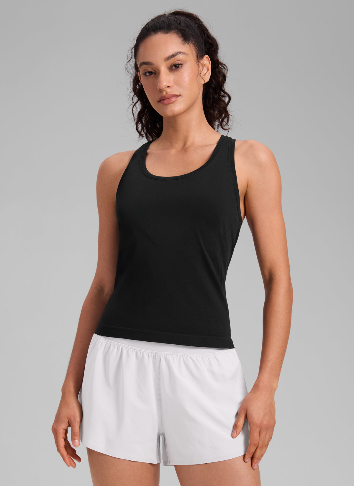 CRZ YOGA Women's Yoga Slim Fit Seamless Tank Crew Neck Racerback Black @model_info:Larissa