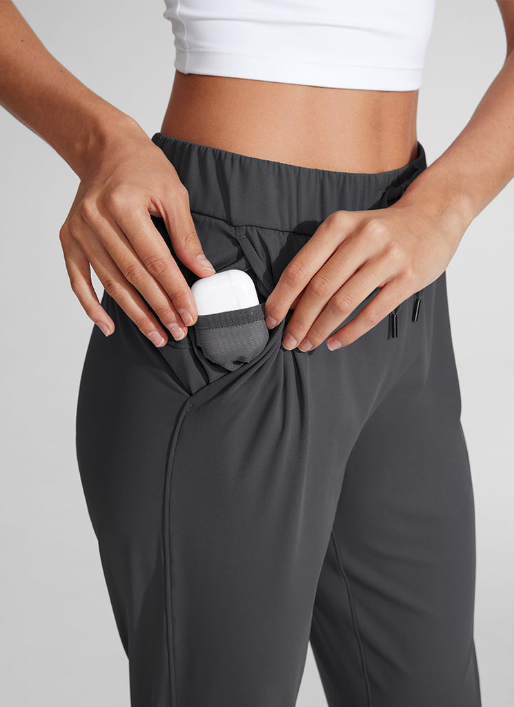 CRZ YOGA Women's Travel Slim Fit Stretch Drawstring 7/8 Pants 27'' Melanite