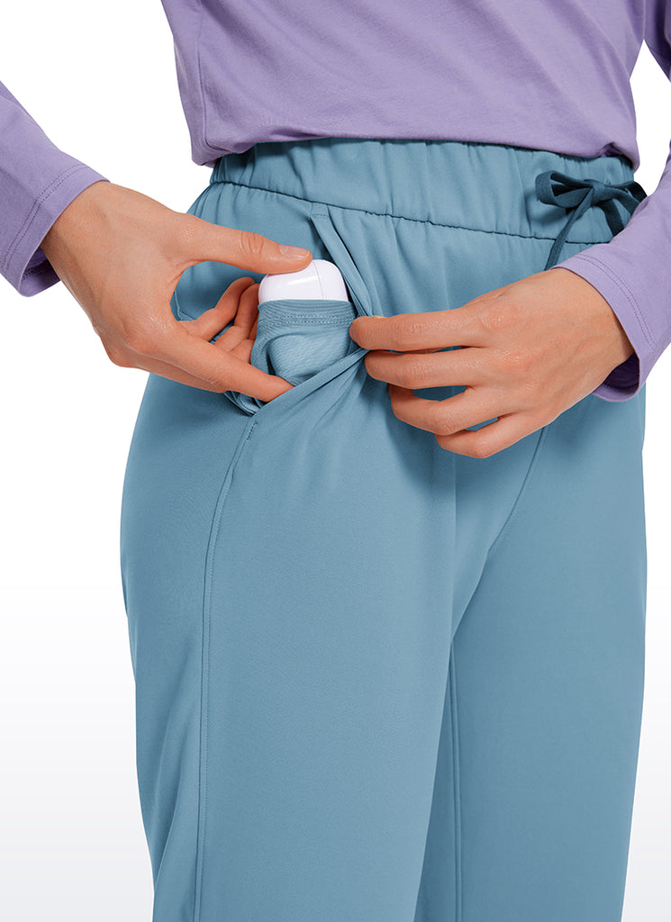 CRZ YOGA Women's Travel Slim Fit Stretch Drawstring 7/8 Pants 27'' Blue Ashes