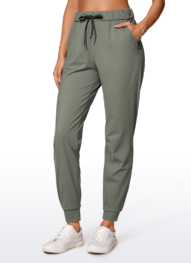 CRZ YOGA Women's Travel Slim Fit Stretch Drawstring Jogger 27'' Slate Blue