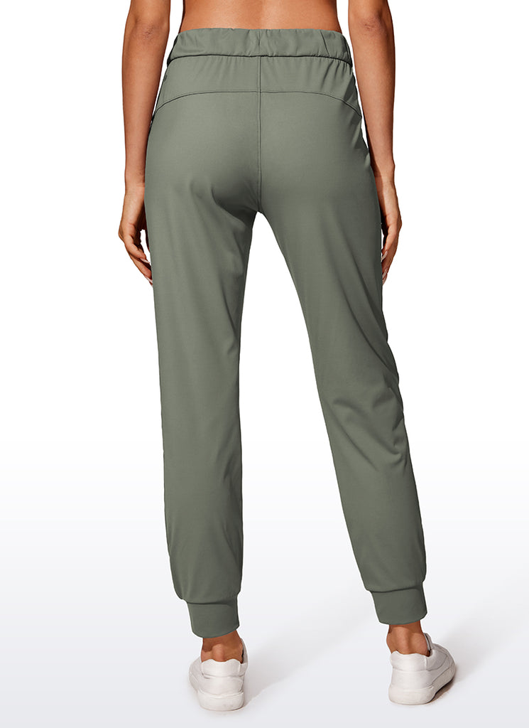 CRZ YOGA Women's Travel Slim Fit Stretch Drawstring Jogger 27'' Slate Blue