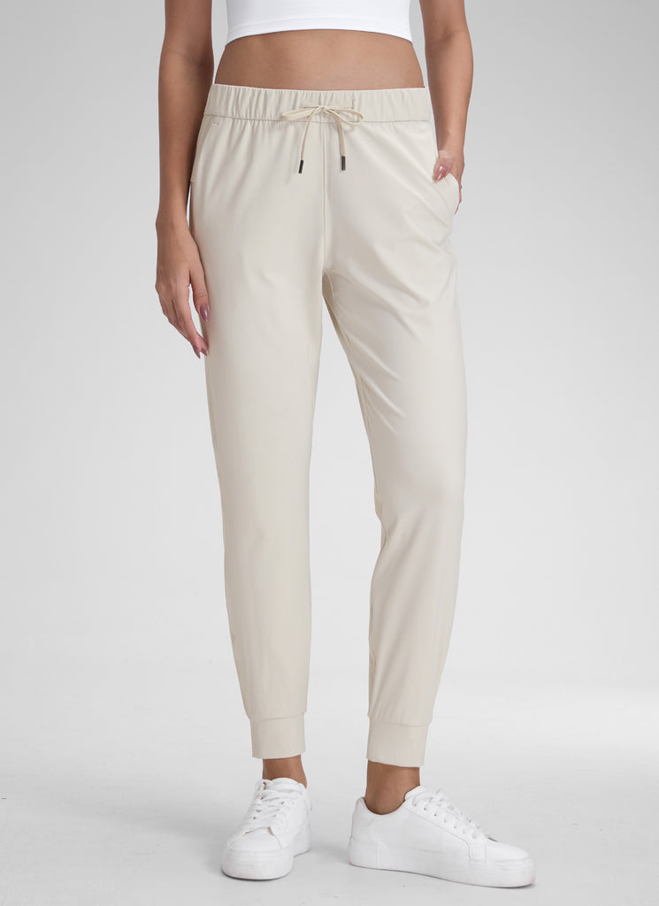 CRZ YOGA Women's Travel Slim Fit Stretch Drawstring Jogger 27'' Forest Dark Green