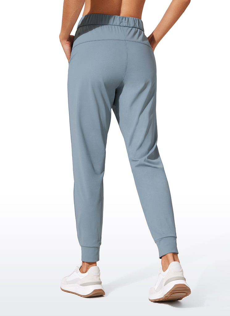 CRZ YOGA Women's Travel Slim Fit Stretch Drawstring Jogger 27'' Belgian Blue