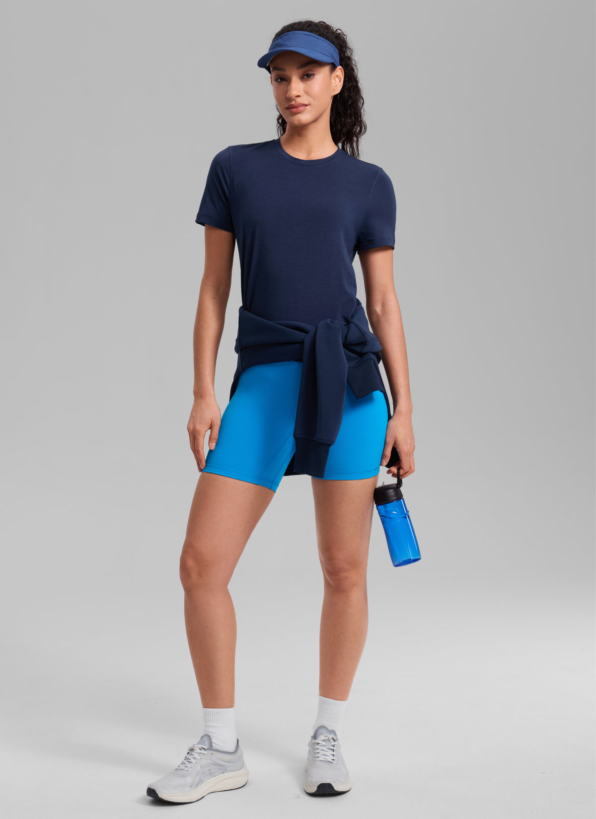 CRZ YOGA Women's Quick Dry Workout Crewneck Hip Length Short Sleeve Club Blue @model_info:Larissa