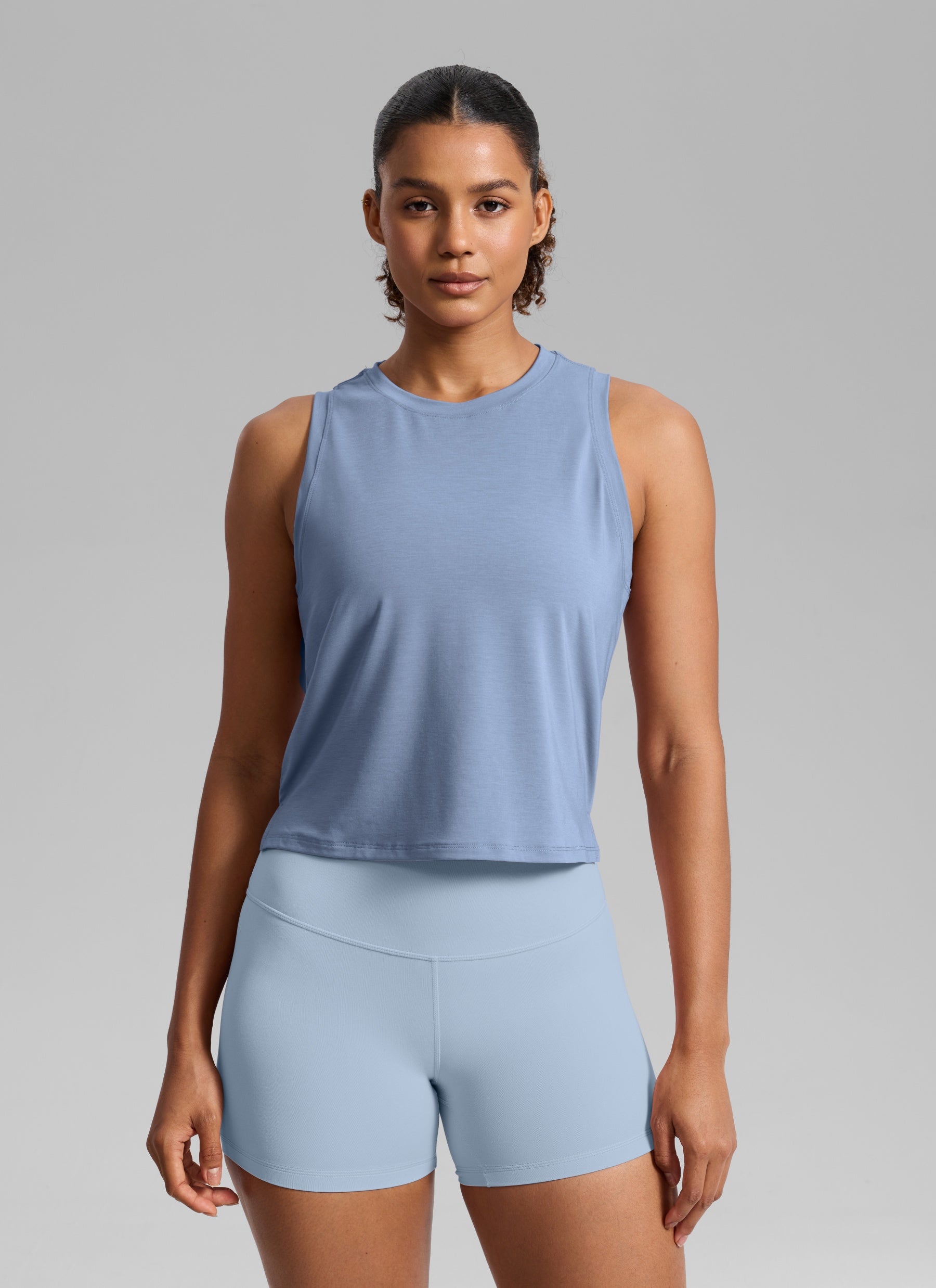 CRZ YOGA Women's Quick Dry Crop Racerback Sleevesless Tank Tops Washed Denim @model_info:B
