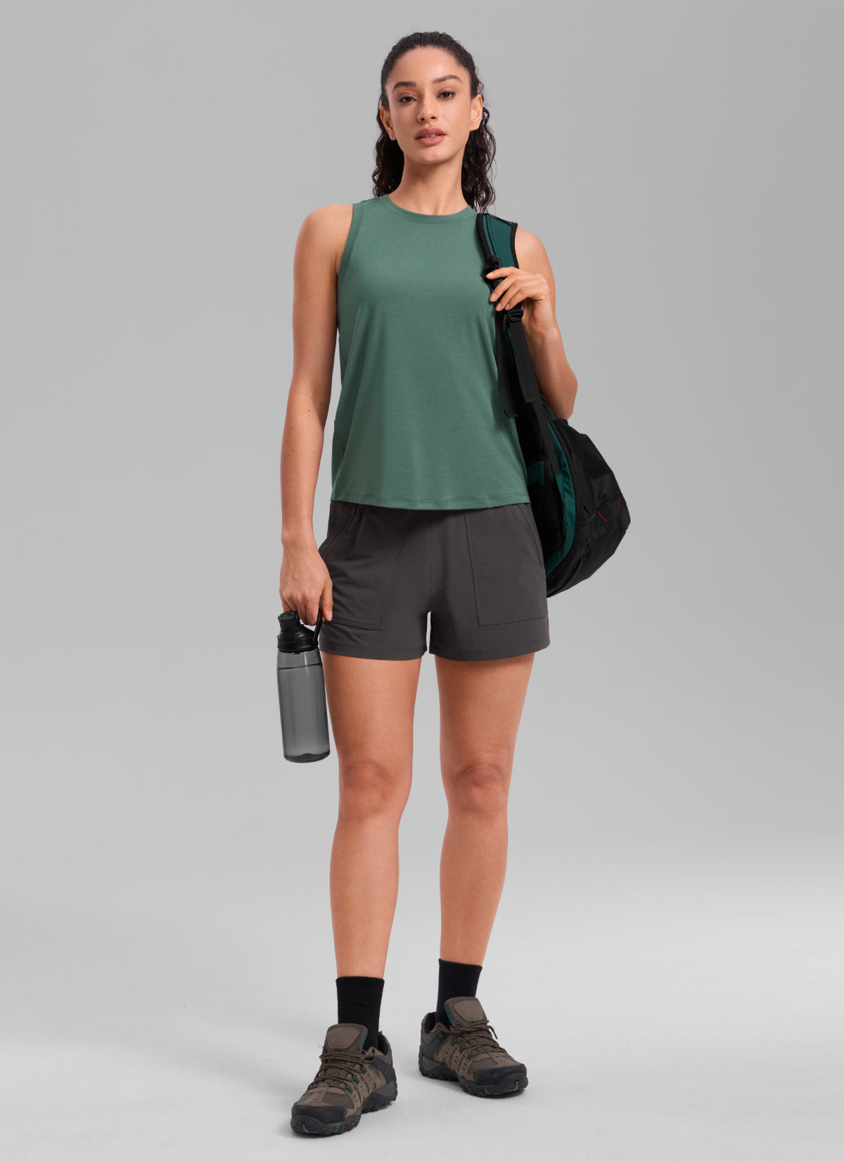 CRZ YOGA Women's Quick Dry Workout Crew Neck Racerback Hip Length Tank Graphite Green @model_info:Larissa