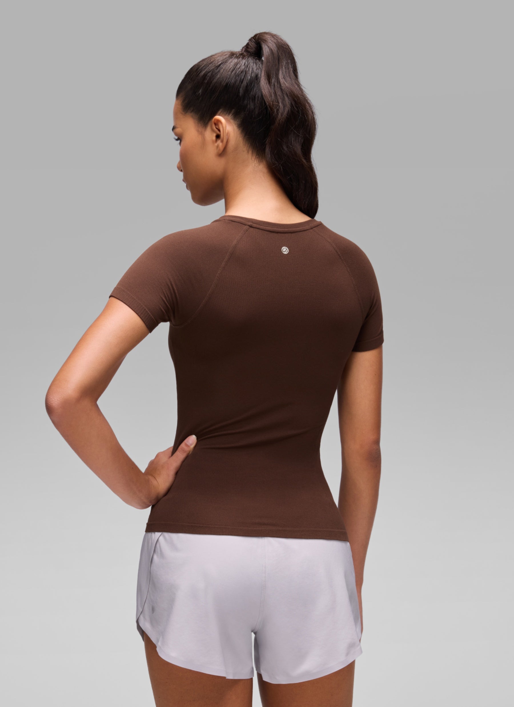 CRZ YOGA Women's Workout Seamless Crewneck Fitted Hip Short Sleeves Lava Brown @model_info:A