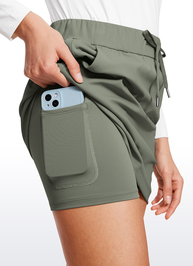CRZ YOGA Women's Casual Golf Stretch High-Rise Drawstring Skirts 15