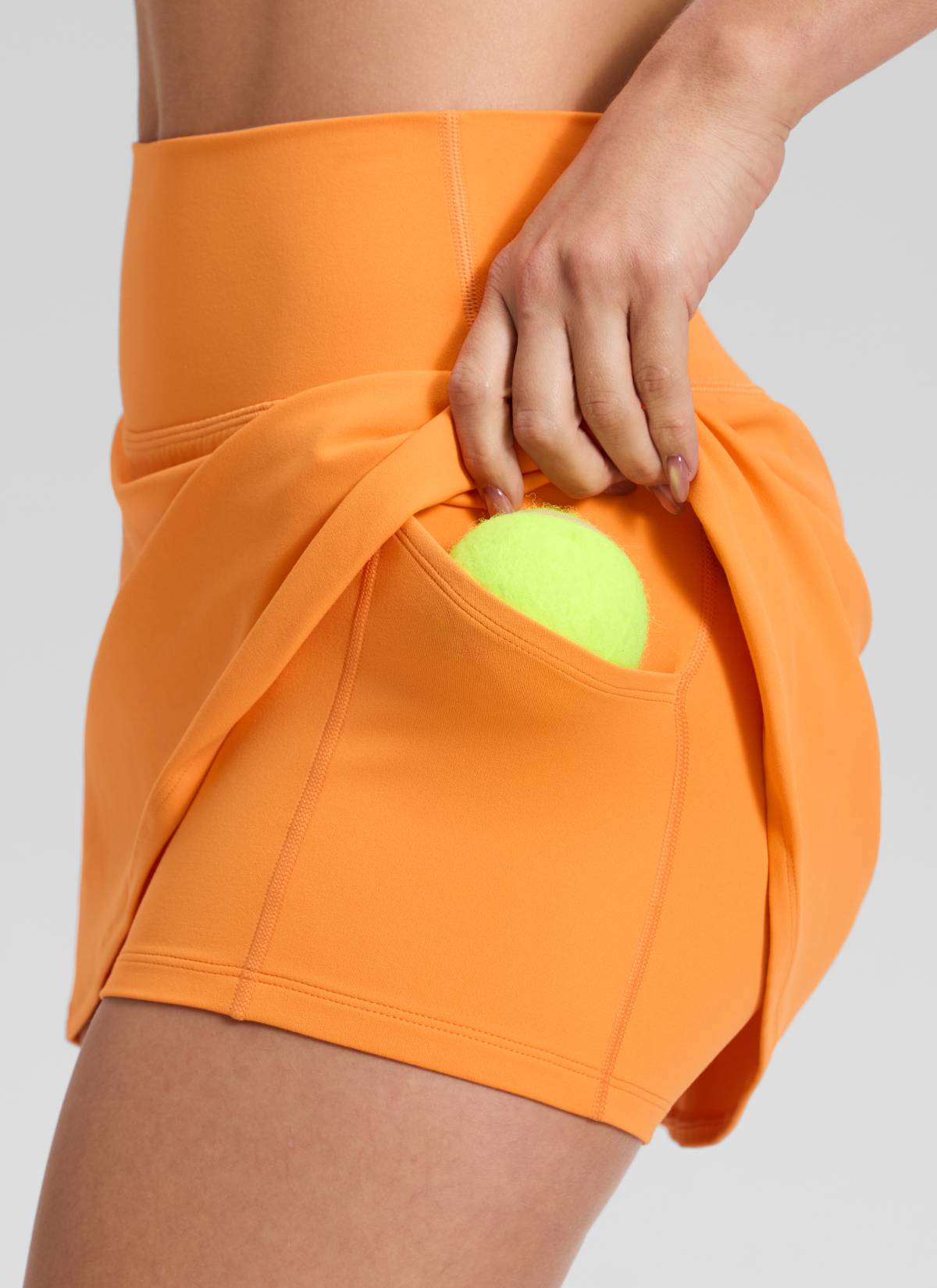 CRZ YOGA Women's Butterluxe High Rise Tennis Skirts 14.5'' with Pocket Tiger Orange