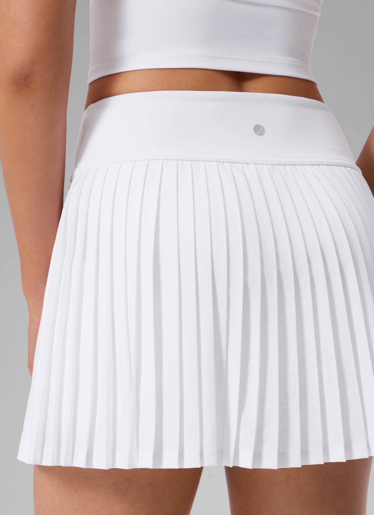 CRZ YOGA Women's Dual-fabric Tennis Pocket Pleated Back Mini Skirt White