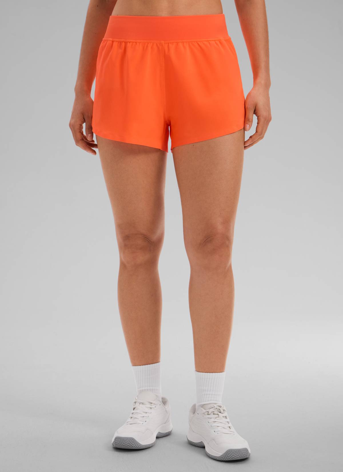 CRZ YOGA Women's Running High Rise Mesh Lined Shorts 3'' Workout Short Neon Orange @model_info:Larissa