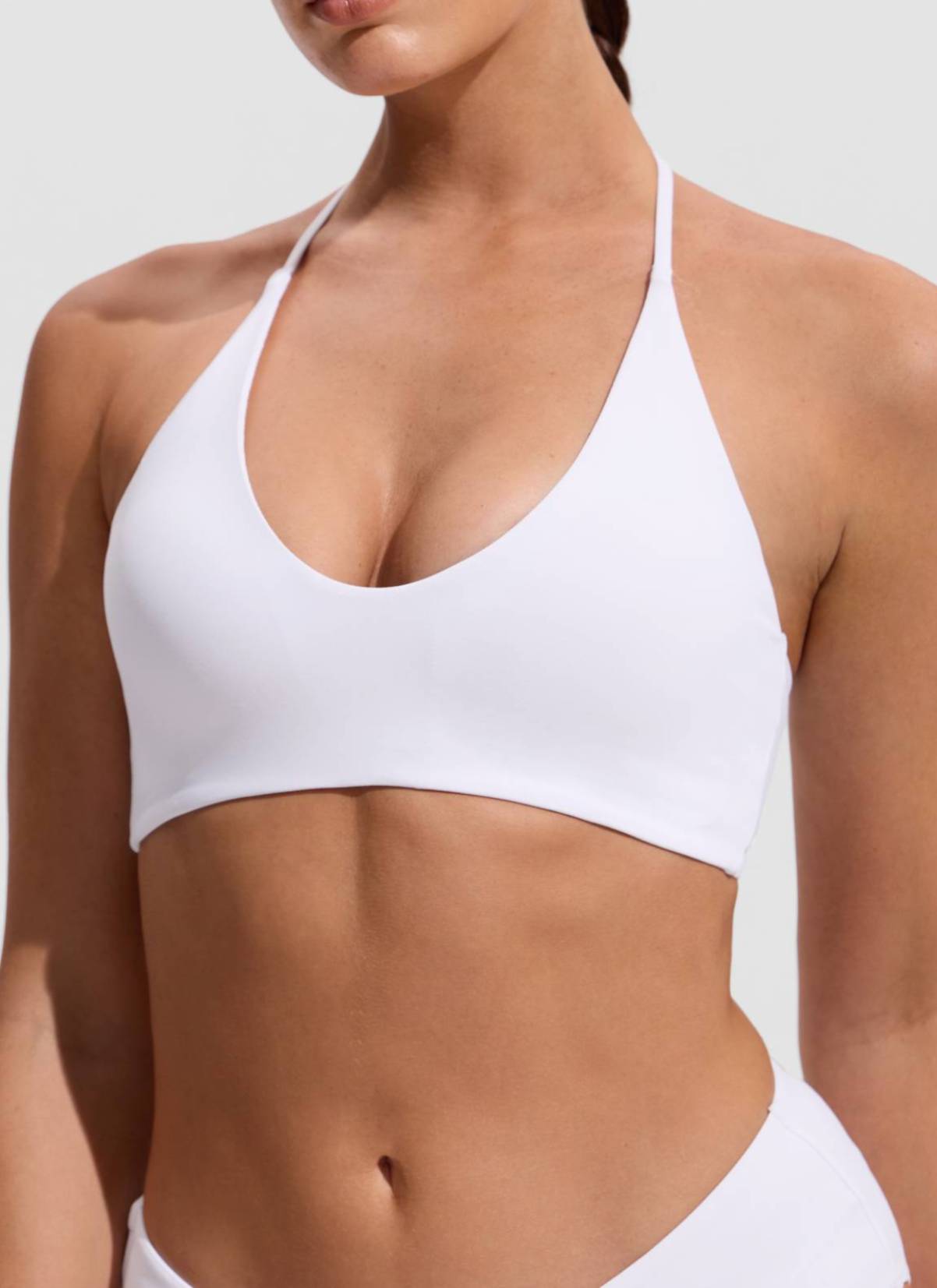 CRZ YOGA Women's Swimwear U Neck Open Back Self Tie Halter Bikini Tops White @model_info:Hannah