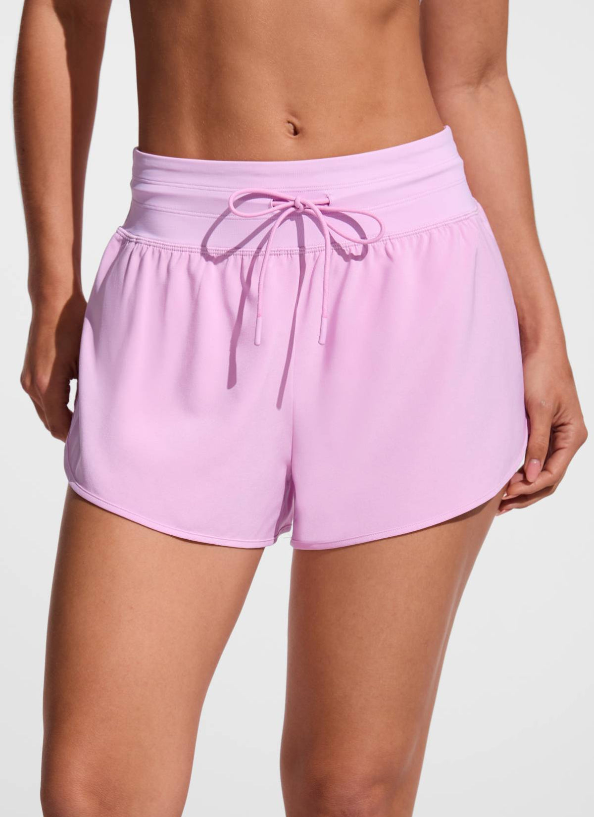 CRZ YOGA Women's Swimwear Feathery-Fit Split Dolphin Swim Shorts 2.5'' Vita Pink @model_info:Aline